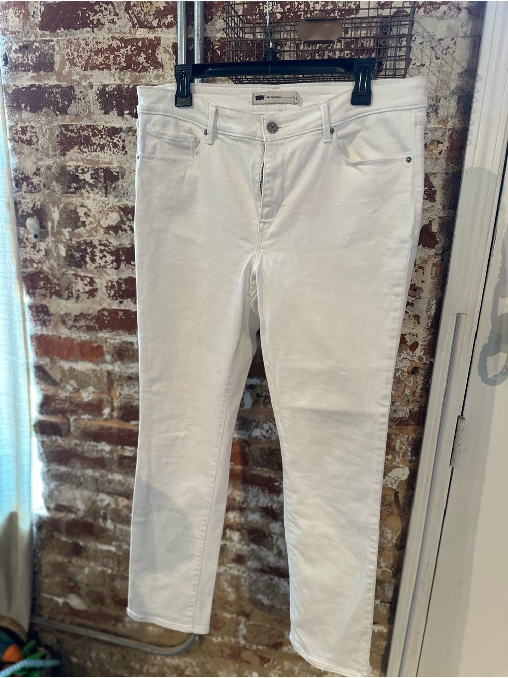 Levi’s Mid Rise White Skinny Jeans, Size 14